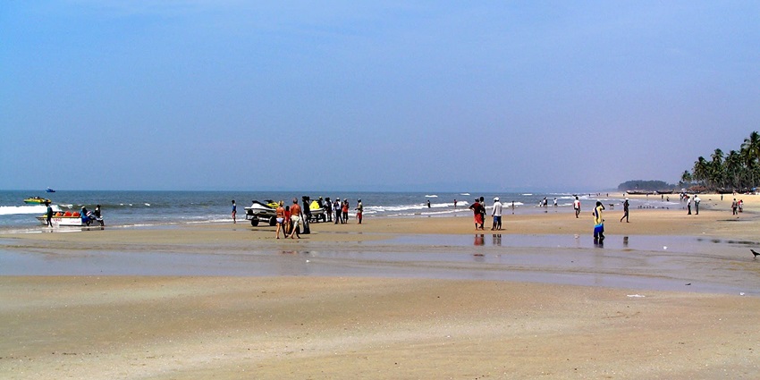 A scenic view of the Colva Beach, one of the top places to visit in Goa at night.