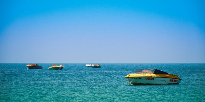 A glimpse of boats parked at the serene Colva Beach which is an offbeat spot in Goa.