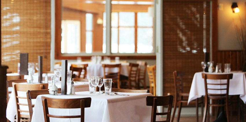 An image representing an elite dining setup inside the Connaught Clubhouse.