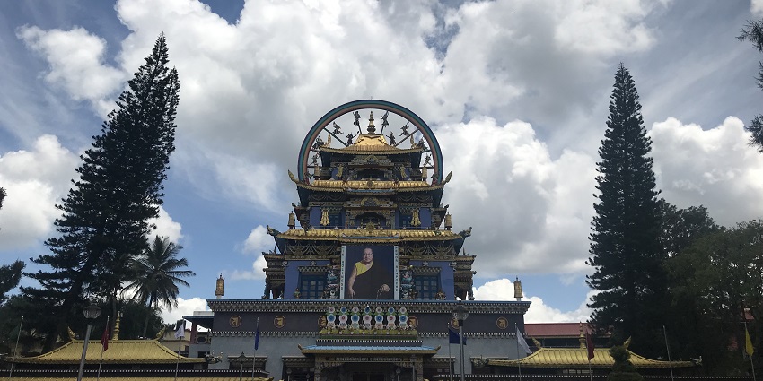 A picture of a Buddhist temple in Coorg, one of the best places to visit near Goa within 300 km