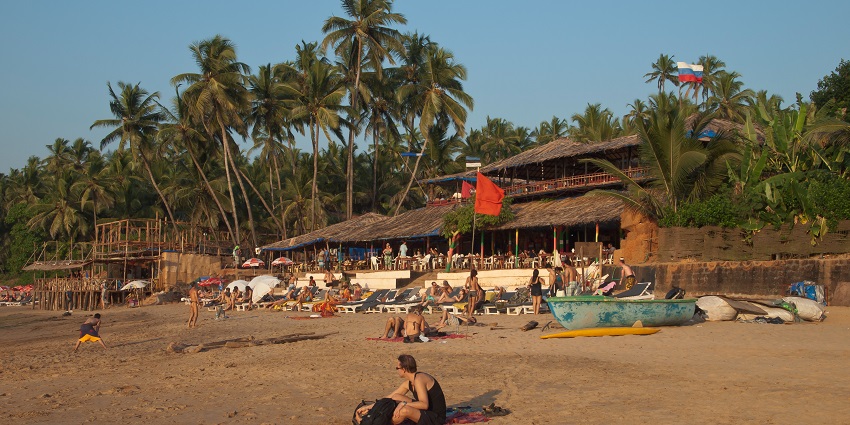 Beautiful evening view of the scenic Cortalim Beach surrounded by the beautiful trees and sand