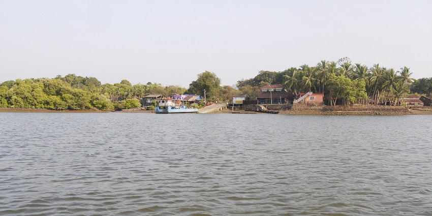Beautiful image of a village across the Zuari river In Cortalim in Goa