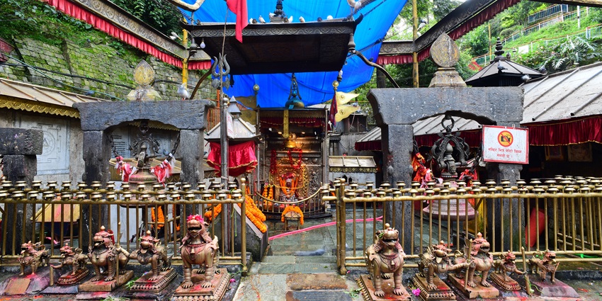 Dakshinkali Temple, a sacred Hindu site in Kathmandu, surrounded by lush greenery.