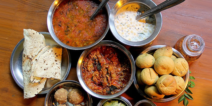Dal Baati Churma is one of the best foods in Ajmer, offering crispy baati, and spicy dal.