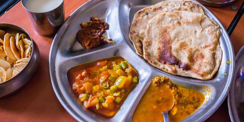 One of the best foods in Jaisalmer is Dal Pakwan, a: crispy bread and spiced lentils.