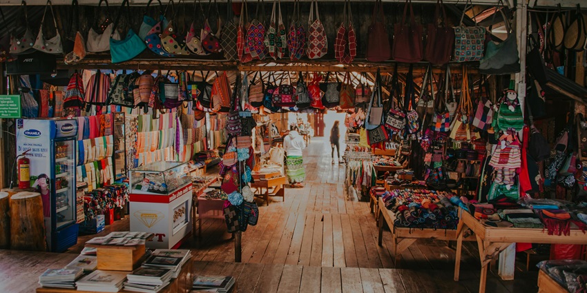 Beautiful image of the maker selling bags in the hills of Himalaya