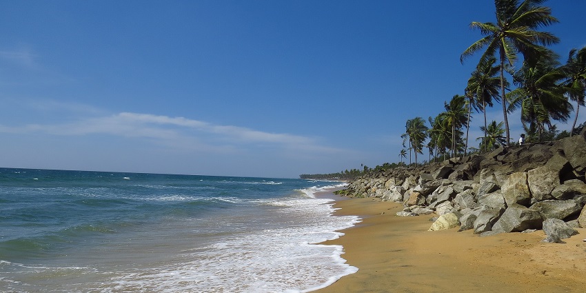 A picture of a scenic beach in Annavaram with shining golden sand and serene waters