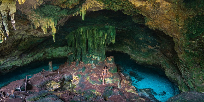 An inner view of the Dandak caves showcasing the limestones hanging from the ceiling.