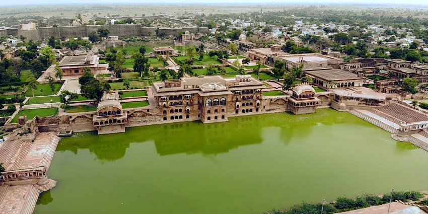 Aerial view of the beautiful Deeg Palace and the lake surrounding it