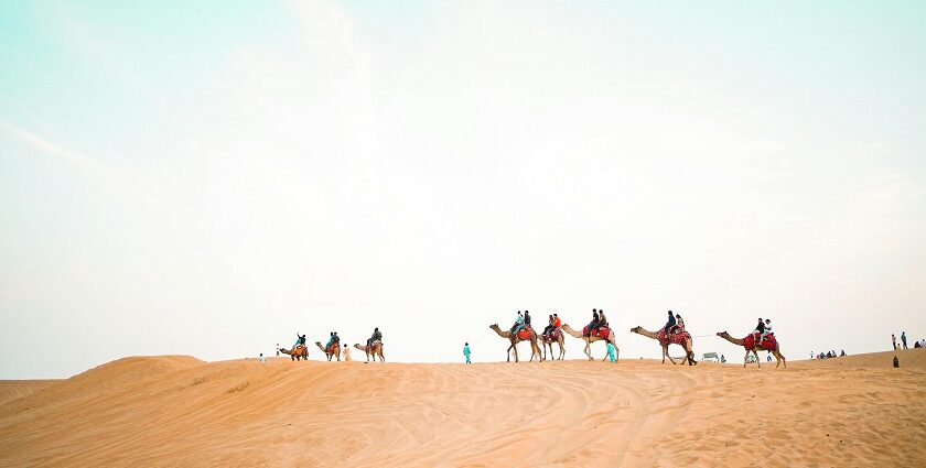 Desert safari Jaisalmer features camel rides, jeep safaris, and Rajasthani traditional dance shows.