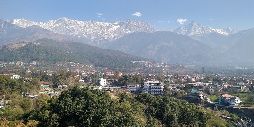 Snow-capped Dhauladhar mountain ranges viewed from Dharamshala on a clear day.