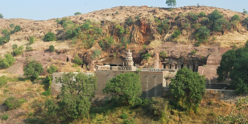 Dharashiv Buddha Caves showcase rock-cut carvings from the 5th-7th century.