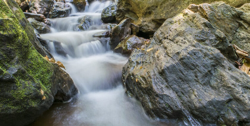 A picture of a waterfall in Andhra Pradesh slowly cascading down a hill