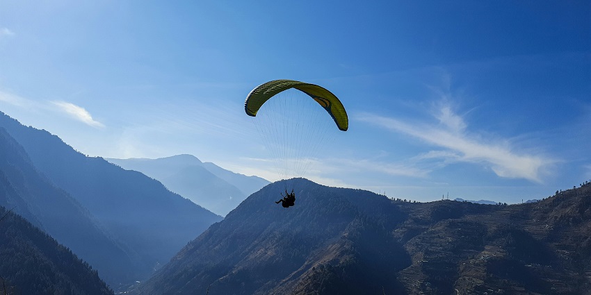 Enjoy the beautiful views of Dharamsala - a spot for paragliding in McLeodganj.