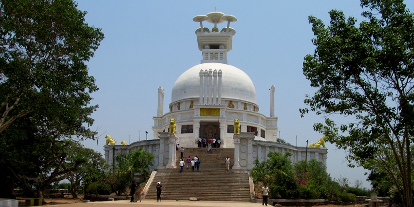 A scenic view of Dhauli hills with Shanti stupa visible in the centre of the hill.