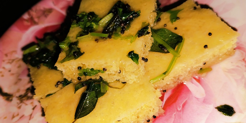 A view of the plate of Dhokla, which is considered a steamed savoury cake.