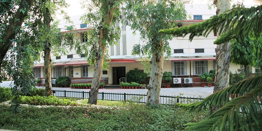 A view of Dholpur House, a colonial-style building, among places to visit near Rajasthan.
