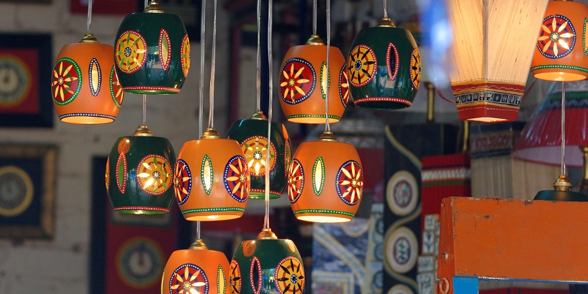 An image of beautiful lamps at a shop in Dilli Haat famous among locals for shopping.