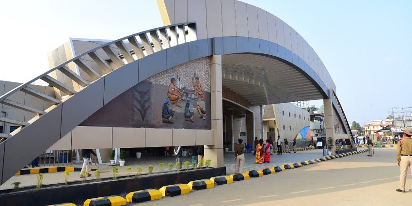 Dimapur Railway Station bustling with travellers, showcasing its vibrant architecture and busy platforms.