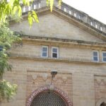 Entrance of Watson Museum in Rajkot, showcasing its historic architecture and cultural significance.