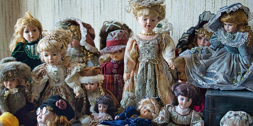 An image showing a collection of dolls of Dolls Museum, one of the famous museums in Jaipur