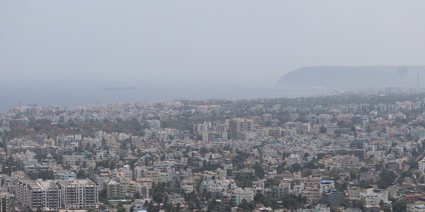 An aerial picture of Visakhapatnam city showing the Dolphin’s Nose Mountain in the background