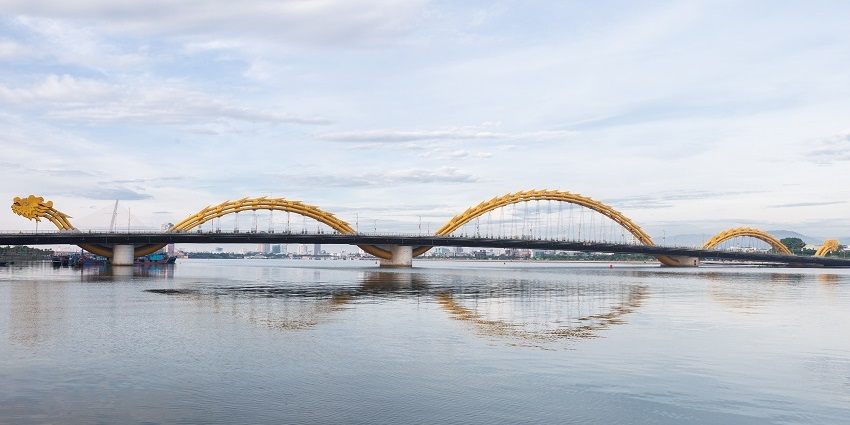Dragon Bridge, a must-see landmark and key in places to visit in Da Nang for a trip.