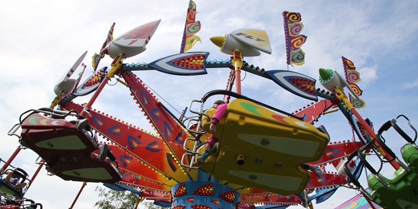 Image of a thrilling ride inside Dreamland Amusement Park, an ideal place for adventure lovers