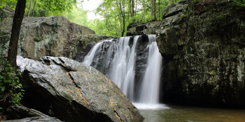 The cascading Dudhsagar Waterfalls, one of the top places to visit near Palolem Beach.