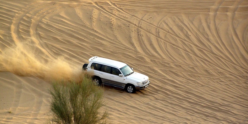 Image of Dune bashing in Bikaner: 4x4 vehicles, steep dunes, stunning views