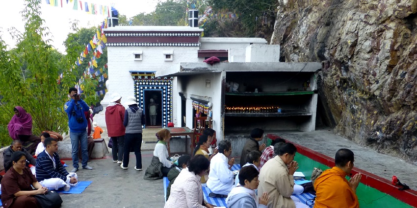 Sacred Dungeshwari Cave a small temple among natural rocks, and devotees praying