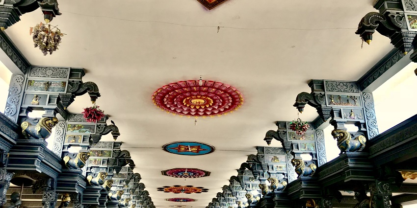 A picture of a temple in Dwaraka Tirumala with intricate carvings and colourful design