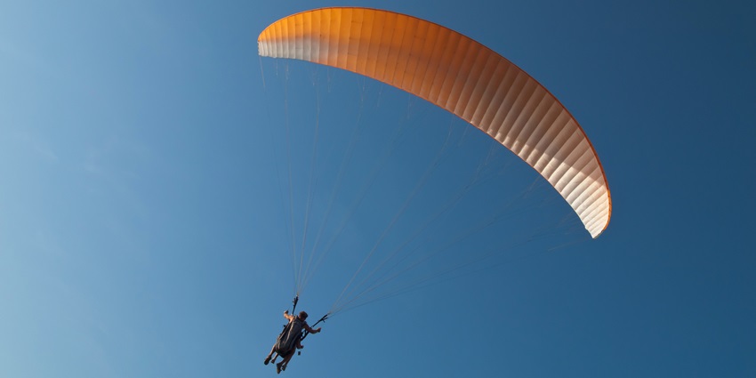 Indulge in the thrilling paragliding over the scenic coastline on your visit to Arambol.