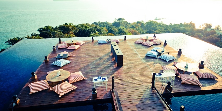 Wooden deck on a swimming pool giving a 360-degree panaromic view of the Andaman Sea