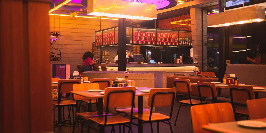 The elegant bar at Eros Lounge in Ahmedabad has a contemporary design and lighting.