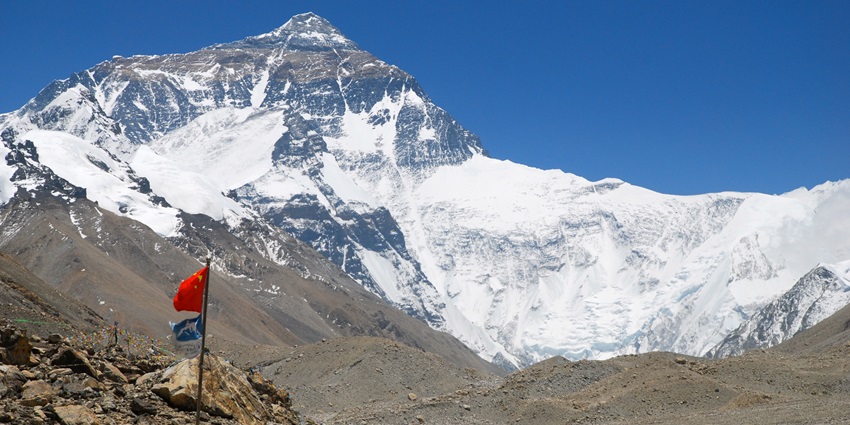 Mount Everest Base Camp near Tengboche Monastery, with tents set against snow-capped peaks.