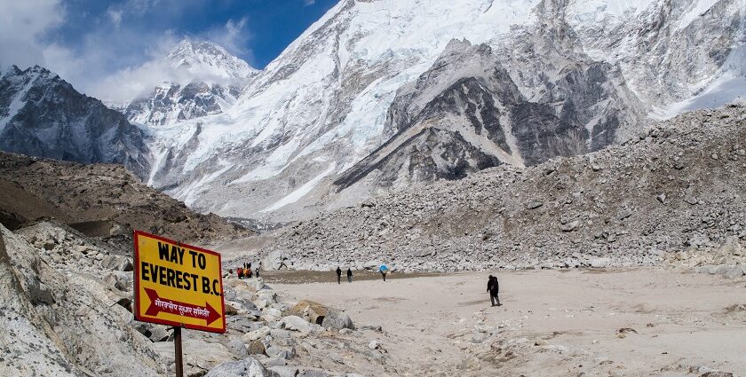 Signpost pointing the way to the Himalaya base camp trek to Everest, located in Nepal.