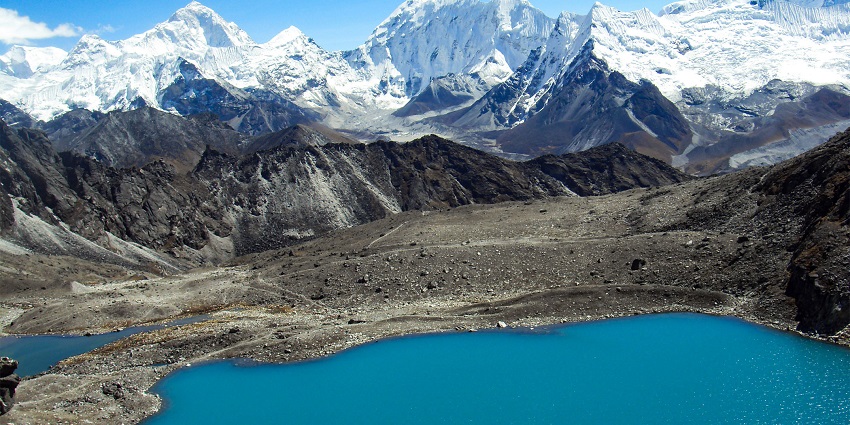 View from Kongma La Pass on the Everest Three Passes Trek with snow-capped peaks.