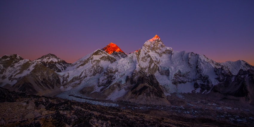 Majestic sunset view of Mount Everest, near Tengboche Monastery, casting vibrant colours.