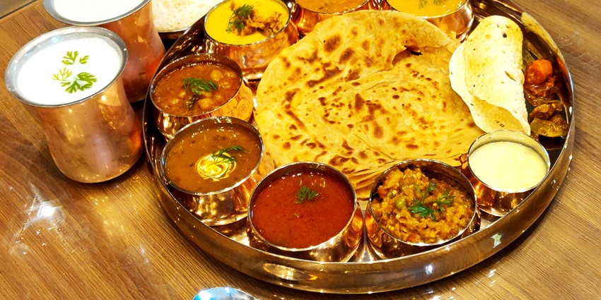 Punjabi dishes, showcasing the vibrant food culture of Ludhiana and highlighting things to do in Ludhiana
