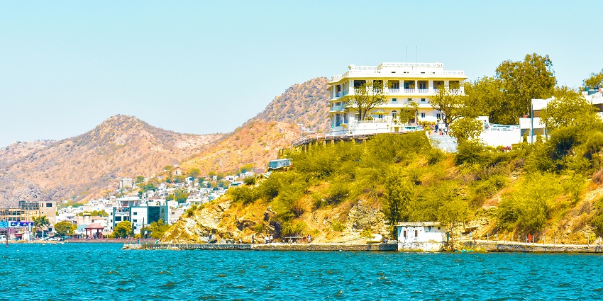 Ana Sagar Lake, with surrounding hills, is a peaceful spot for relaxation in Ajmer, Rajasthan.