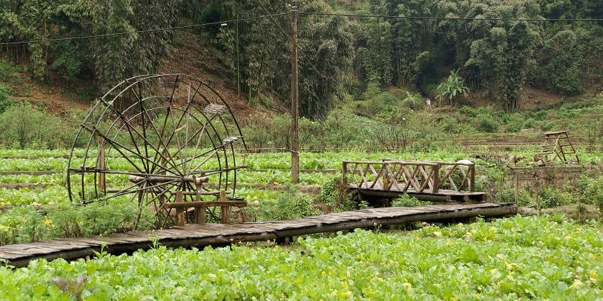 Exploring traditional water wheels in Cat Cat Village is one of the best things to do in Sapa, showcasing Hmong culture