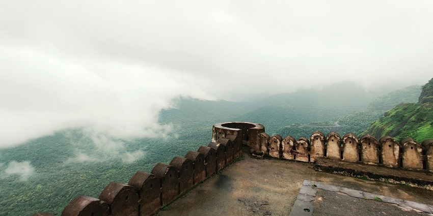 Image of mountains view covered in misty weather from a fort view you can enjoy