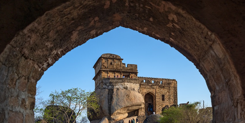 Madan Mahal Fort, showcasing its ancient architecture through an archway