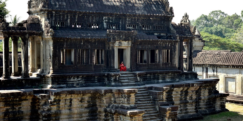 An image of the Saas Bahu Temples with detailed sculptures and lush surroundings.