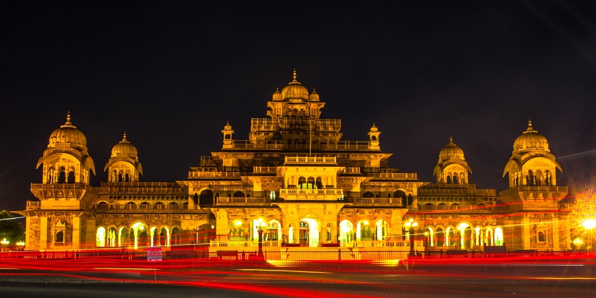 Albert Hall Museum in Jaipur, illuminated at night, showcasing its grand architecture and offering a romantic evening visit for couples.