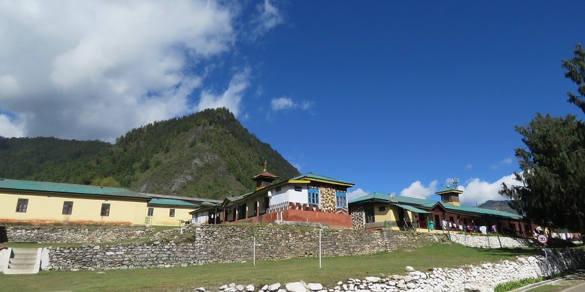 Tranquil valley with traditional Bhutanese village life and serene natural beauty.