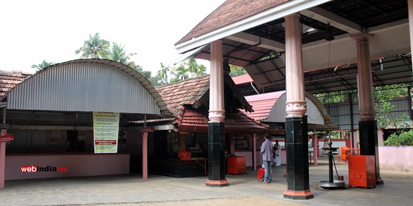 Front view of the Ameda Nagaraja Temple, showcasing its traditional Kerala architecture