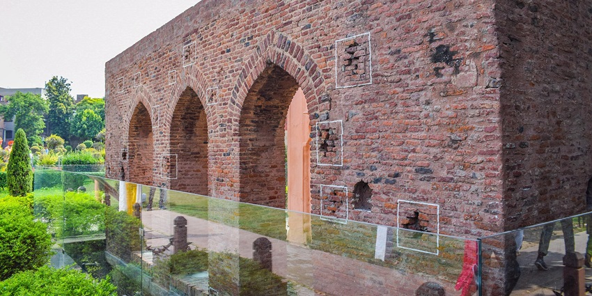 The bullet marks fired at people by General Dyer in the huge massacre.