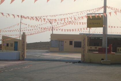 A view of the exterior during the daytime with decorations for festivities to be conducted.